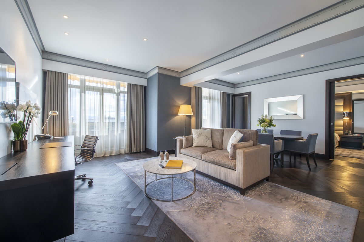 Elegantly styled living room with neutral tones and plush furnishings, exuding a serene and sophisticated ambiance ideal for upscale living.